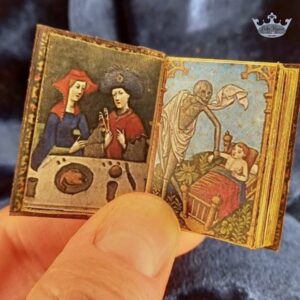 Open illustrated miniature murder handbook